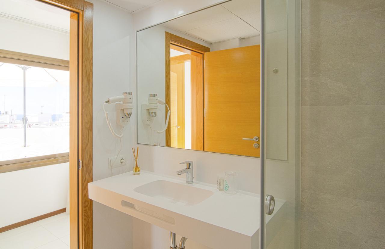 Apartamentos Bon Lloc ซานตาเอวเลเรียเดสริว ภายนอก รูปภาพ